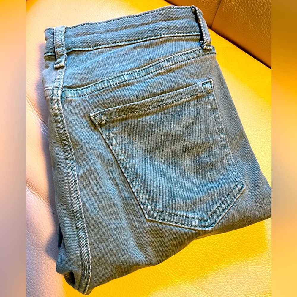 These dreamy eggshell blue pants are a Spring fan favourite. Size 5, Garage.